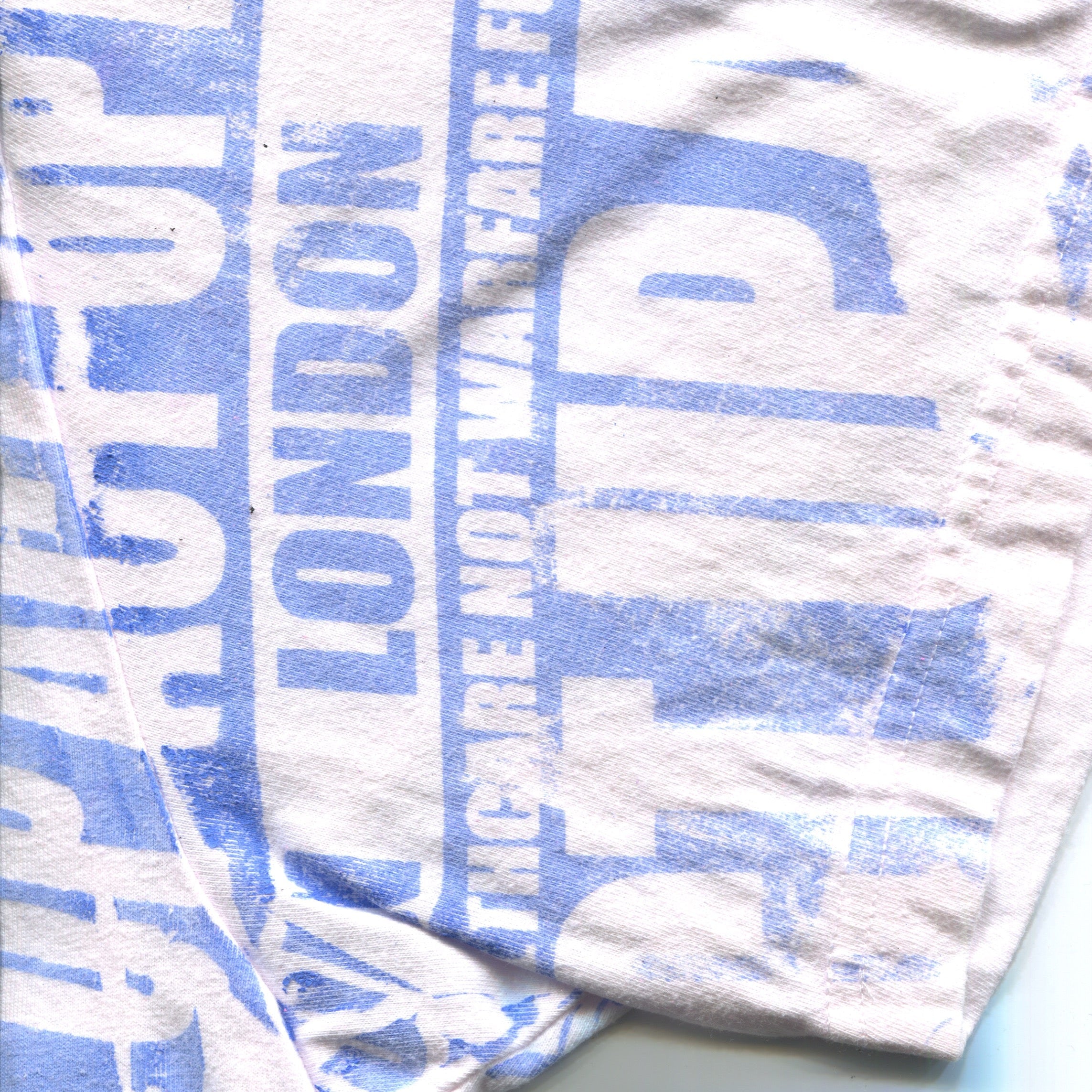10F1 HEALTH CARE NOT WARFARE TEE
