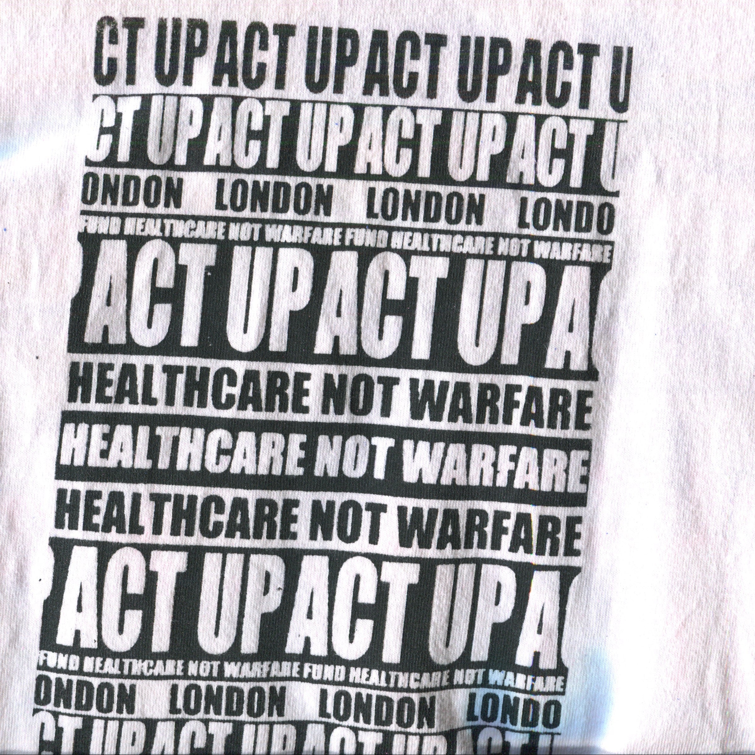 10F1 HEALTH CARE NOT WARFARE TEE